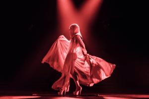 A woman in a revealing Star Wars outfit does burlesque