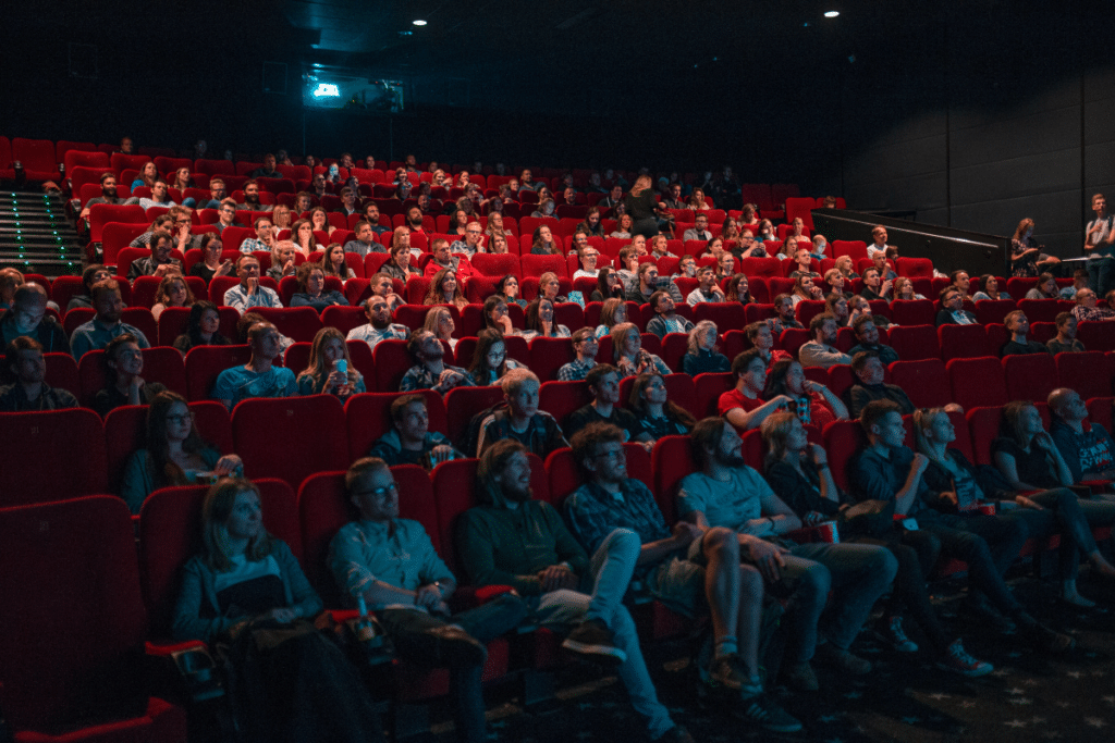 Audience at the cinema watching a movie
